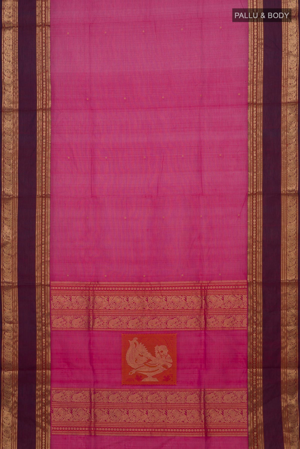 Flat view of Rani Pink Silk Cotton Saree with Zari Butta on the body and Zari Border. 