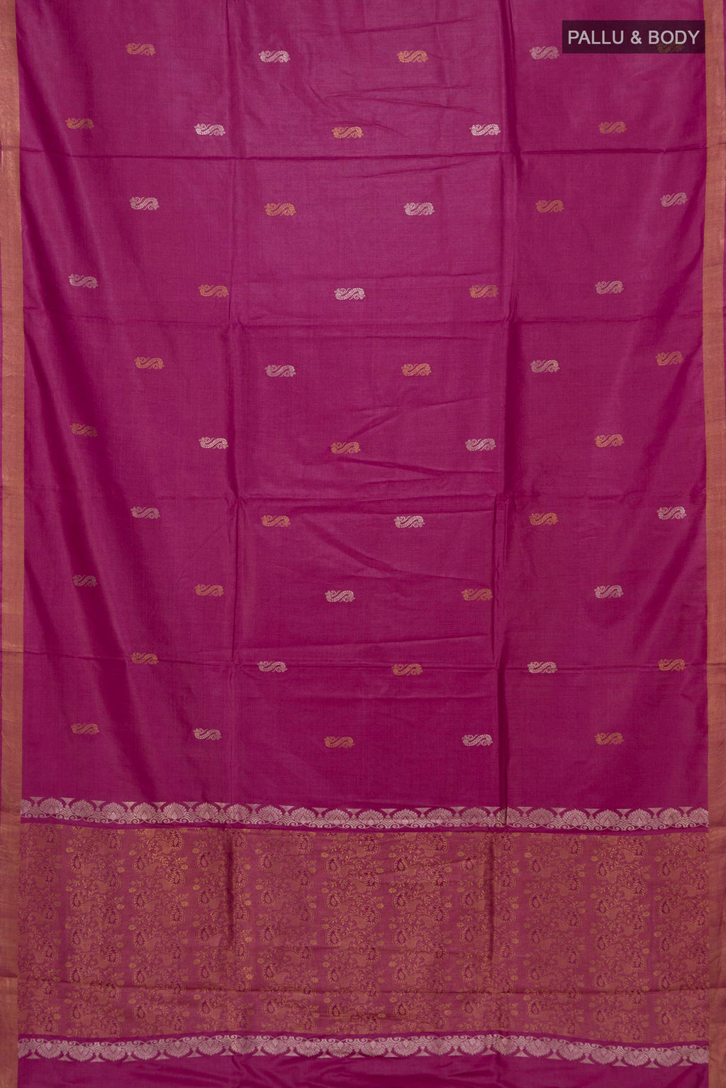 Flat view of Magenta Tussar Saree with Zari Butta on the body and Zari Border. 