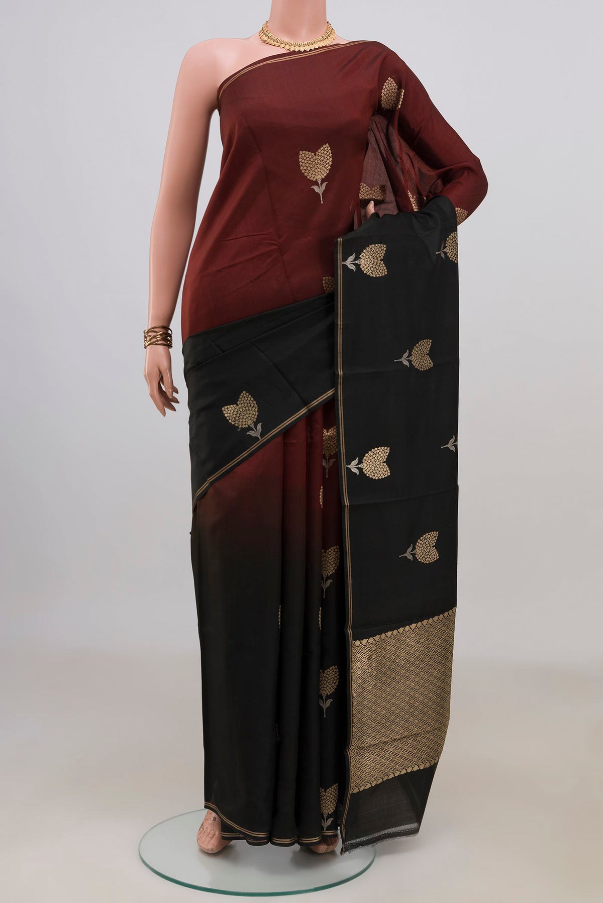 Pure Silk Multi Color Banarasi Katan Saree with Zari Butta on the body and Thin Zari Line.  displayed on a mannequin