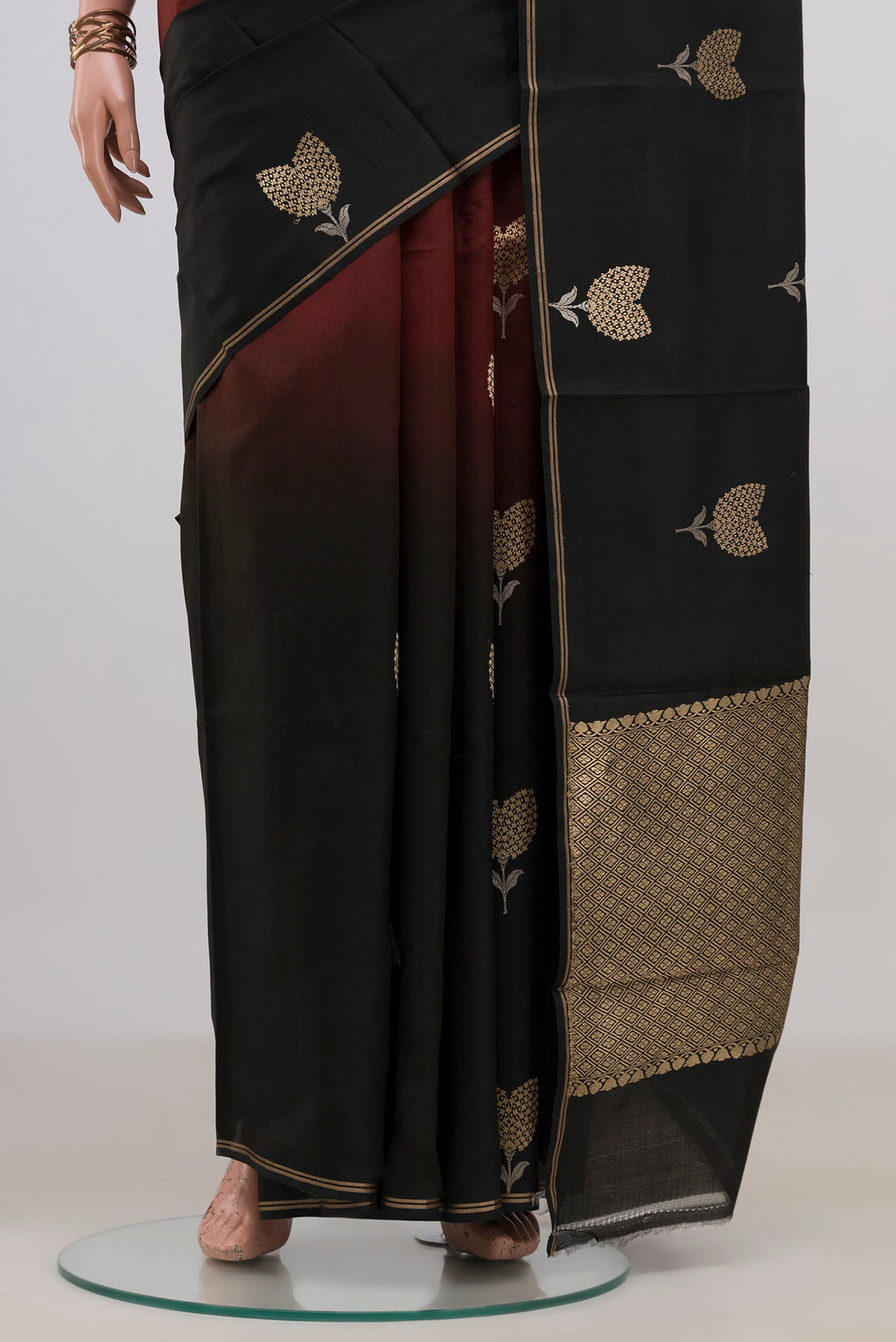 Pleats and pallu of Pure Silk Multi Color Banarasi Katan Saree with Zari Butta on the body and Thin Zari Line. 