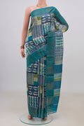 Multi Color Tussar Saree with Printed design on the body and Zari Border.  displayed on a mannequin