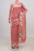 Peach Tussar Saree with Zari Butta on the body and Fancy Border.  displayed on a mannequin