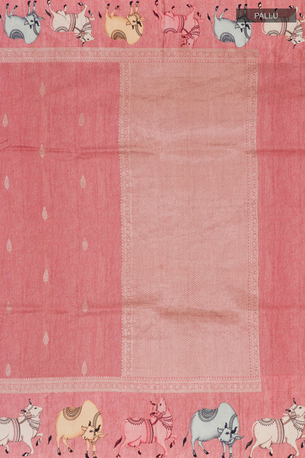 Close up image of the pallu of Peach Tussar Saree with Zari Butta on the body and Fancy Border. 