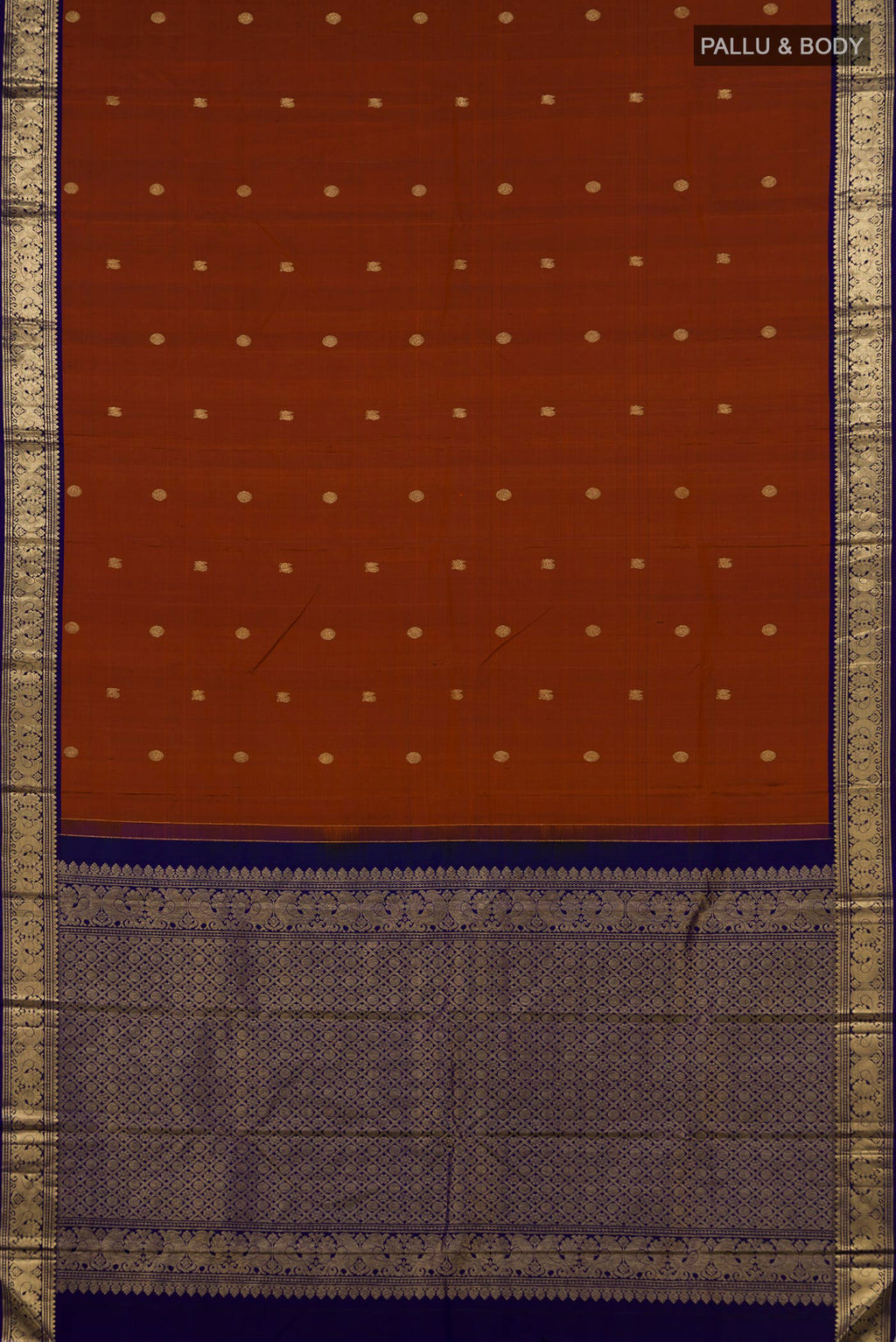 Flat view of Pure Silk Rust Kanjivaram Saree with Zari Butta on the body and Zari Border. 