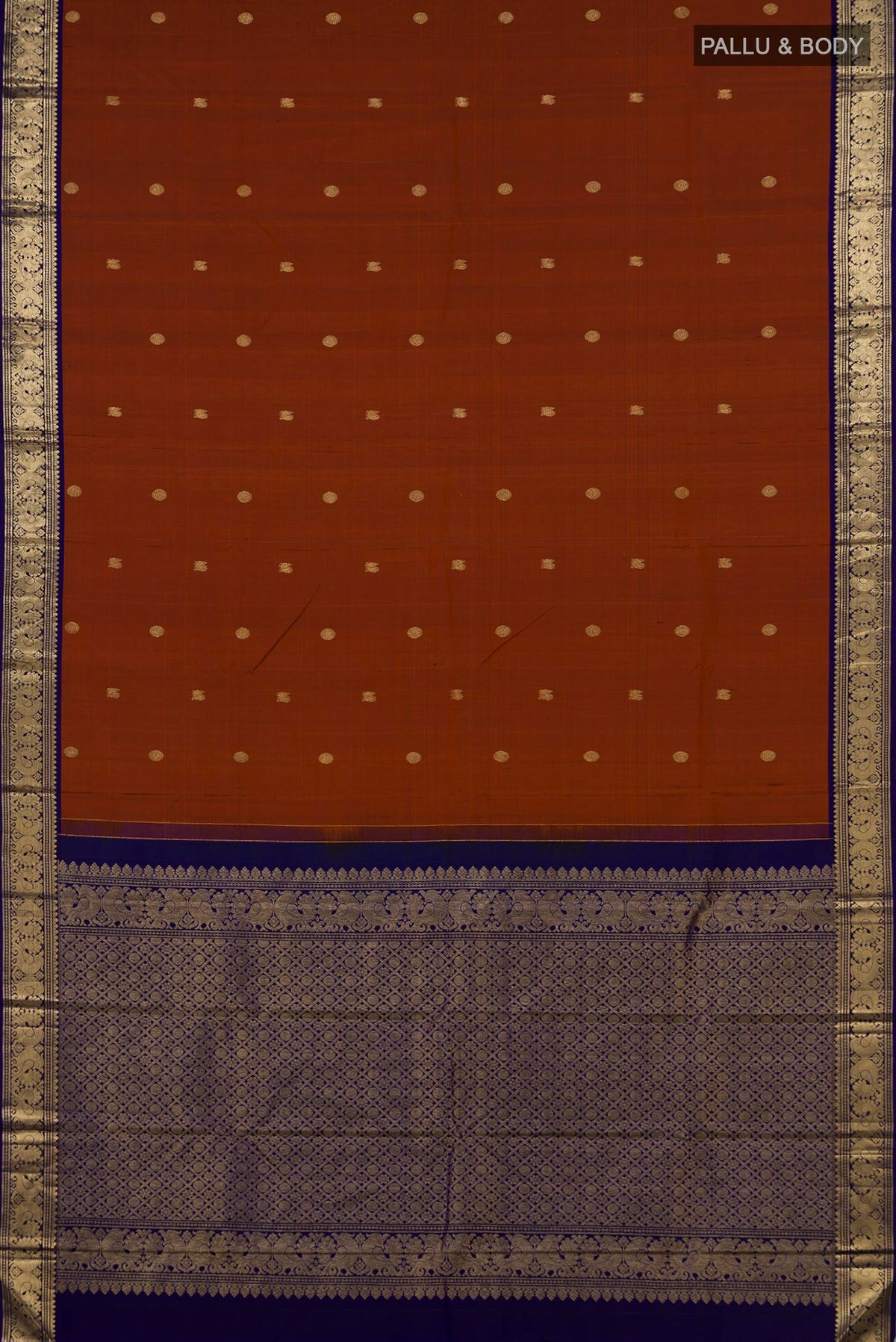 Flat view of Pure Silk Rust Kanjivaram Saree with Zari Butta on the body and Zari Border. 