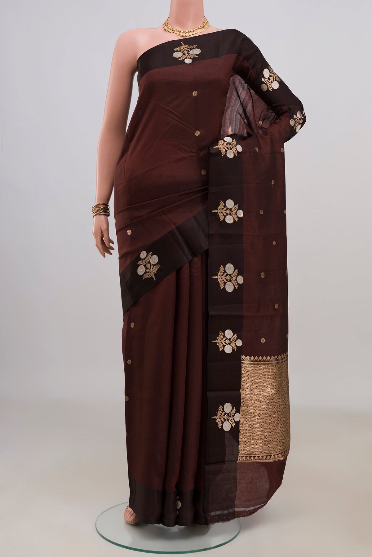 Pure Silk Coffee Brown Banarasi Katan Saree with Zari Butta on the body and Fancy Border.  displayed on a mannequin