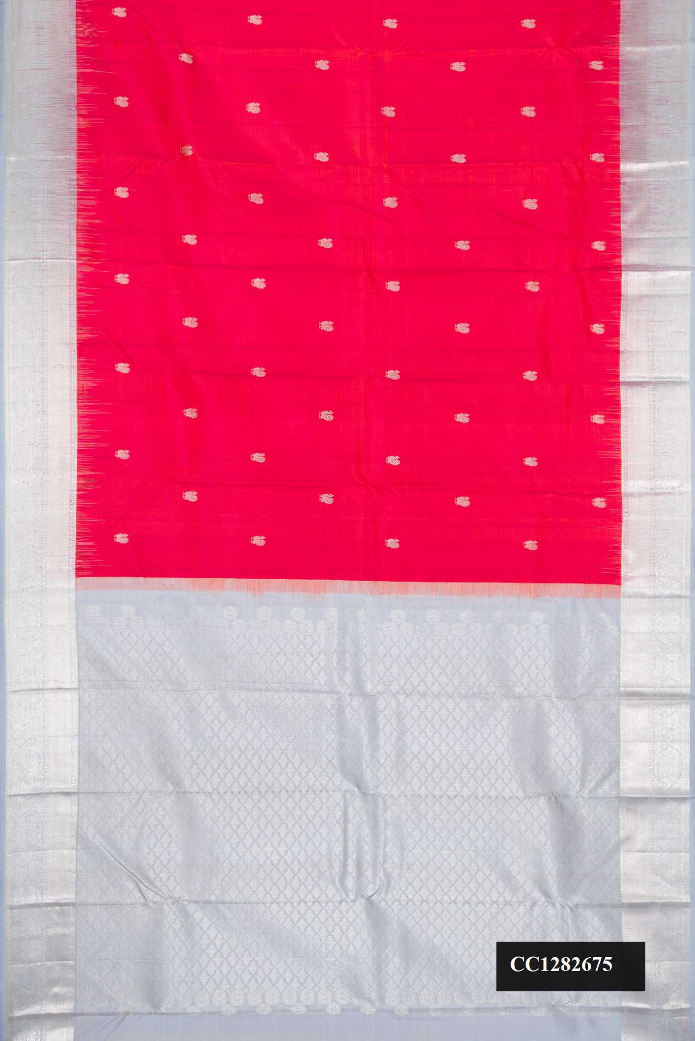 Red Dual Tone Kanchipuram Silk Saree with Zari Butta on the body and Zari Border.  displayed on a mannequin