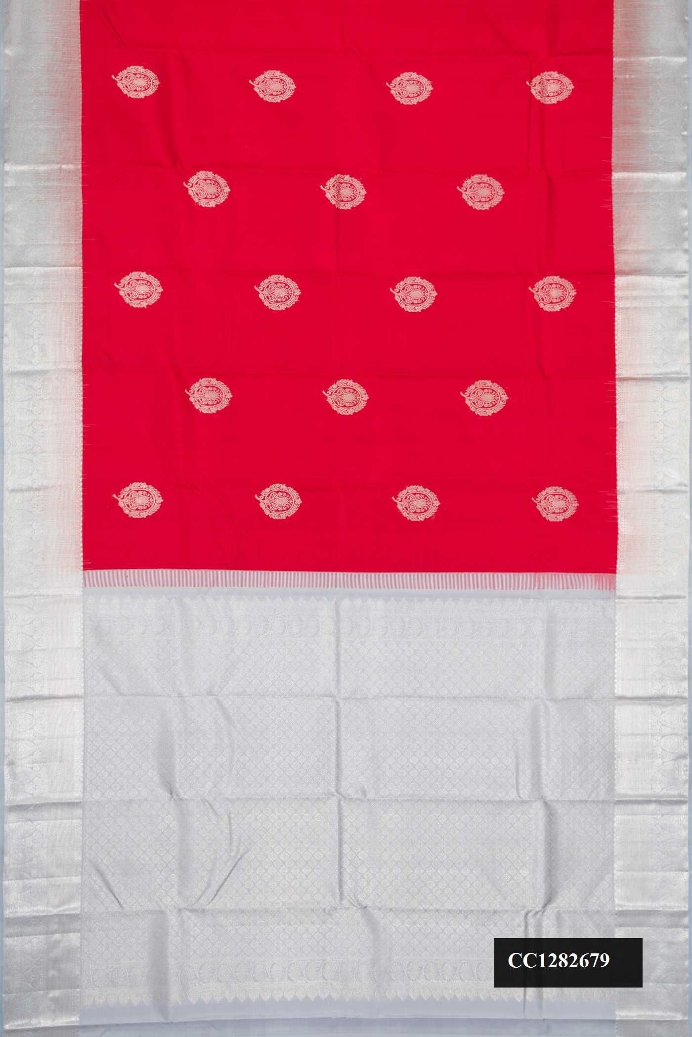 Red Dual Tone Kanchipuram Silk Saree with Zari Butta on the body and Zari Border.  displayed on a mannequin