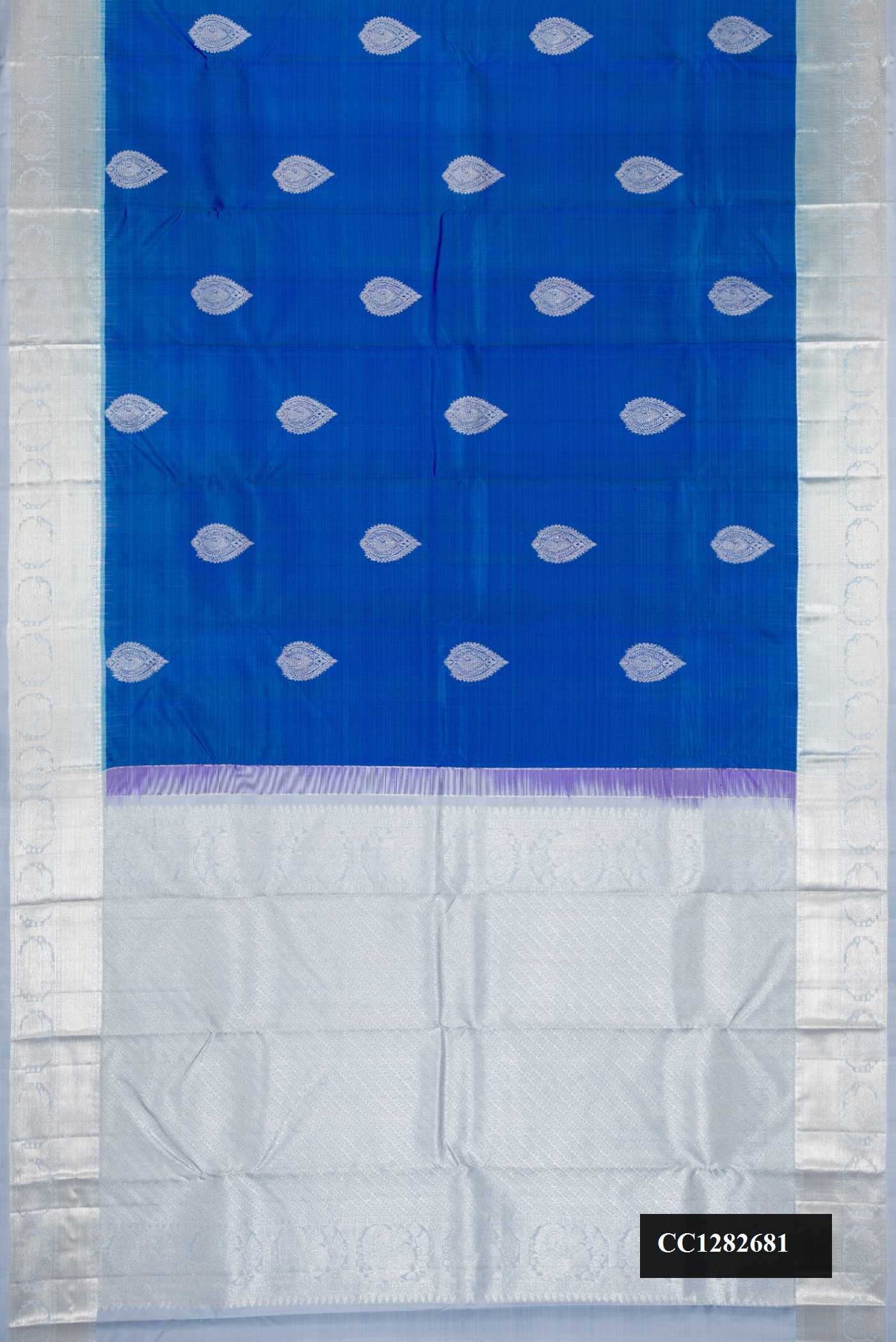 Royal Blue Dual Tone Kanchipuram Silk Saree with Zari Butta on the body and Zari Border.  displayed on a mannequin