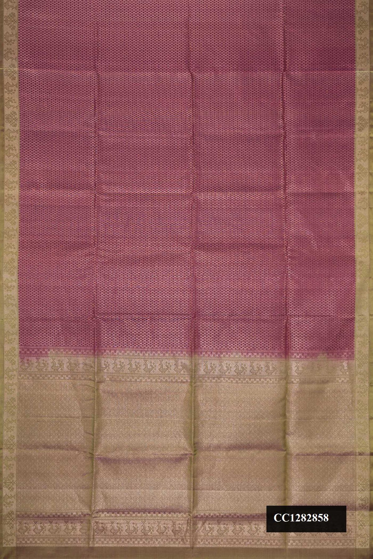 Maroon Dual Tone Soft Silk Saree with Zari Brocade on the body and Zari Border.  displayed on a mannequin