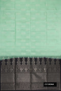 Pista Green Dual Tone Soft Silk Saree with Zari Brocade on the body and Without Border.  displayed on a mannequin