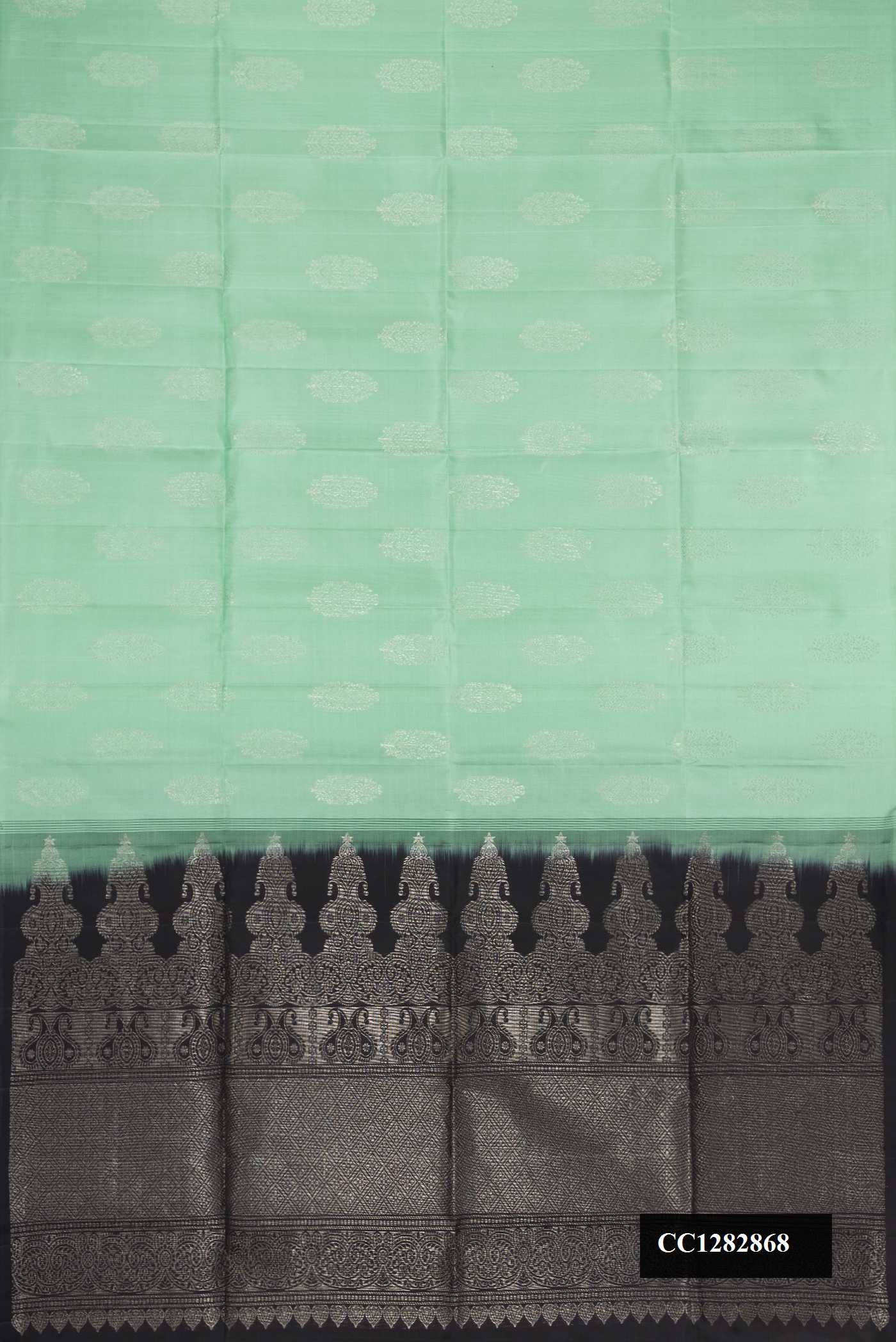 Pista Green Dual Tone Soft Silk Saree with Zari Brocade on the body and Without Border.  displayed on a mannequin