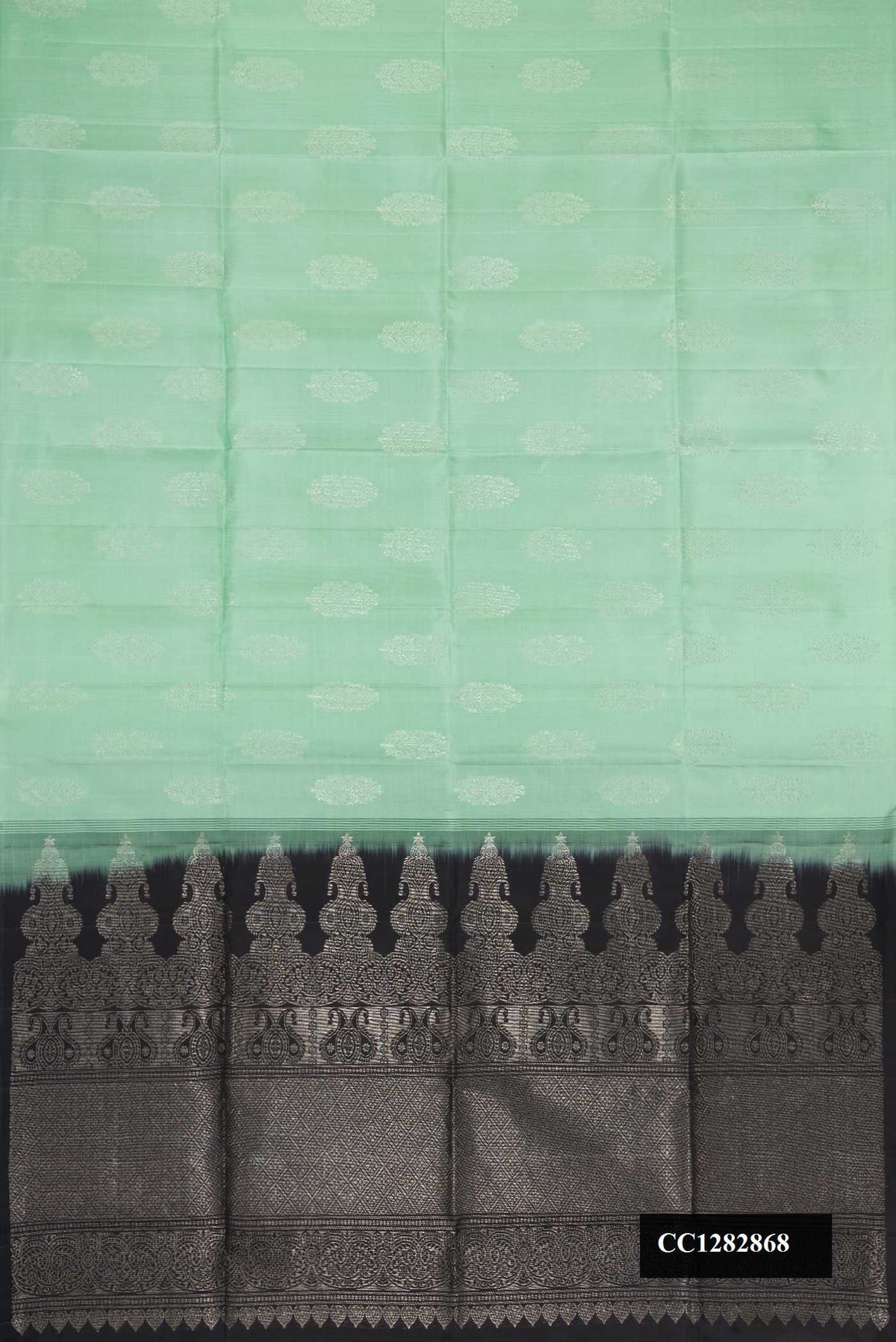 Pista Green Dual Tone Soft Silk Saree with Zari Brocade on the body and Without Border.  displayed on a mannequin