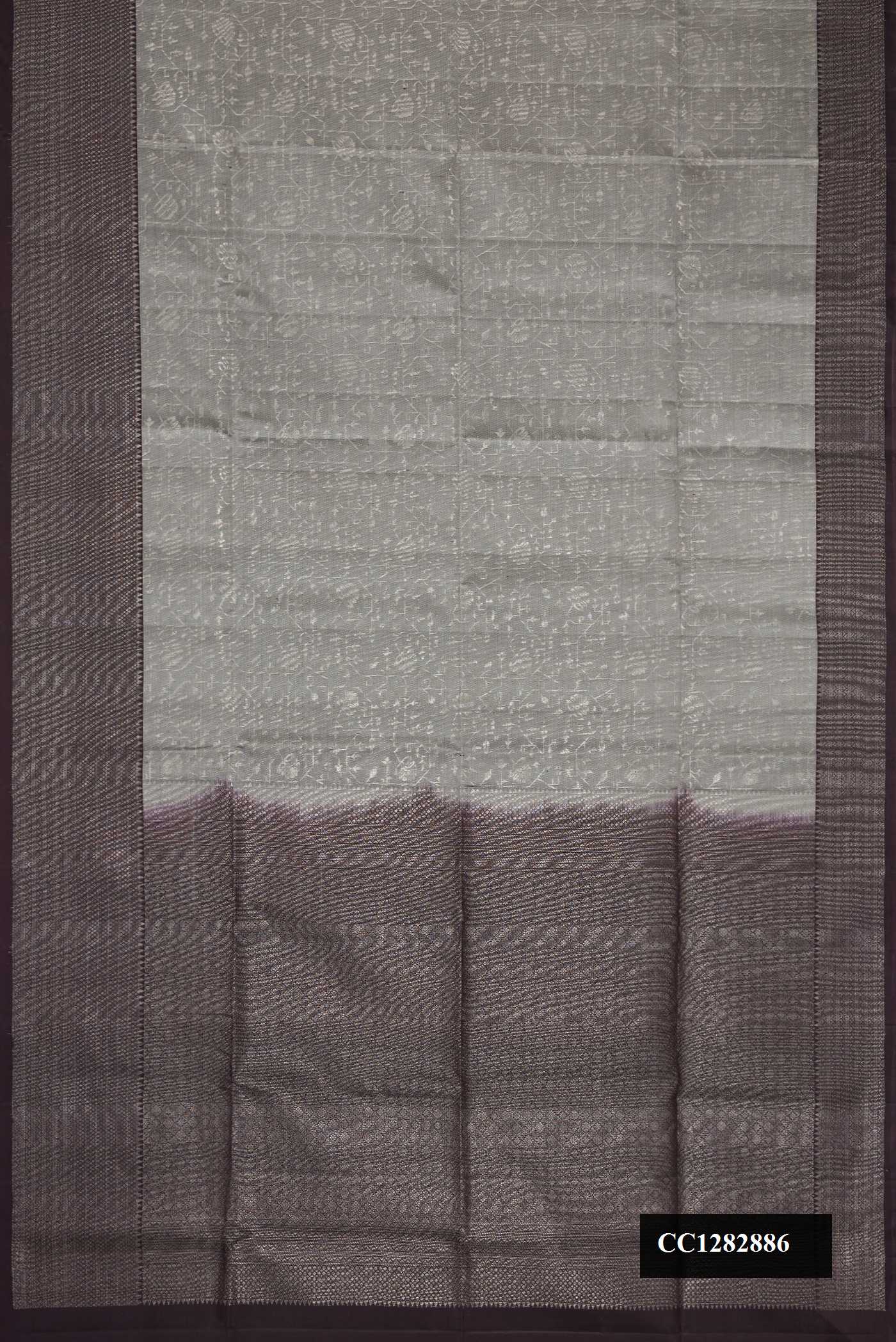 Grey Dual Tone Soft Silk Saree with Zari Brocade on the body and Zari Border.  displayed on a mannequin