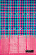Pink and Sea Green Dual Tone Soft Silk Saree with Checked design on the body and Without Border.  displayed on a mannequin