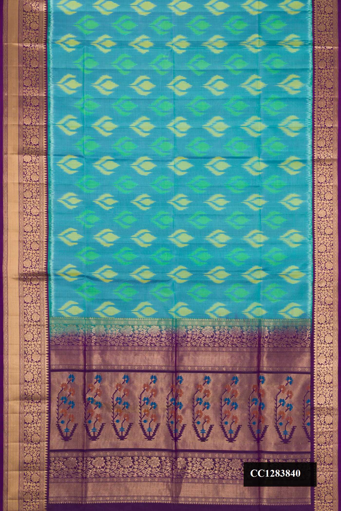 Sea Green Dual Tone Soft Silk Saree with Ikat Print on the body and Zari Border.  displayed on a mannequin