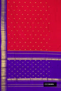 Red Dual Tone Kanchipuram Silk Saree with Zari Butta on the body and Zari Border.  displayed on a mannequin