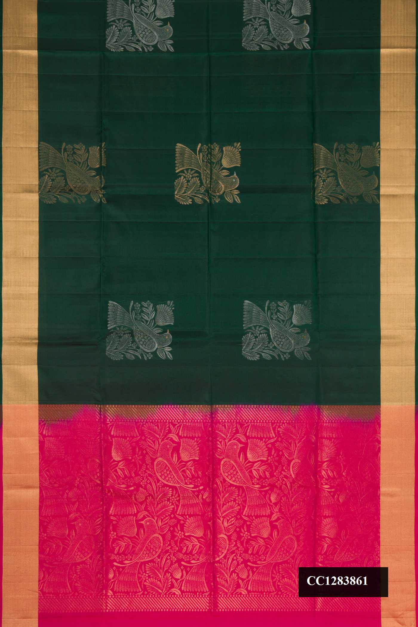 Bottle Green Dual Tone Soft Silk Saree with Zari Butta on the body and Zari Border.  displayed on a mannequin