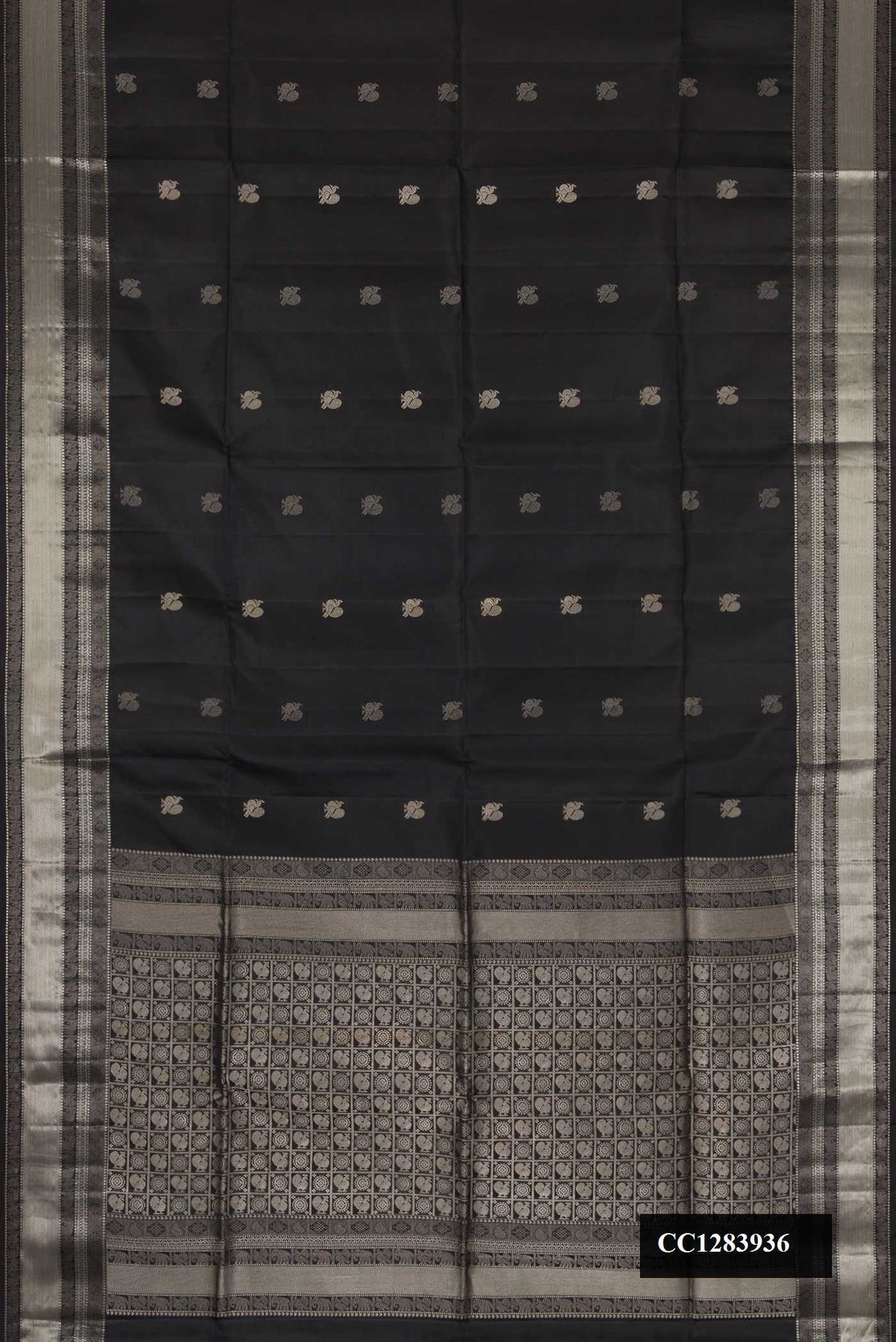 Black Dual Tone Soft Silk Saree with Zari Butta on the body and Zari Border.  displayed on a mannequin