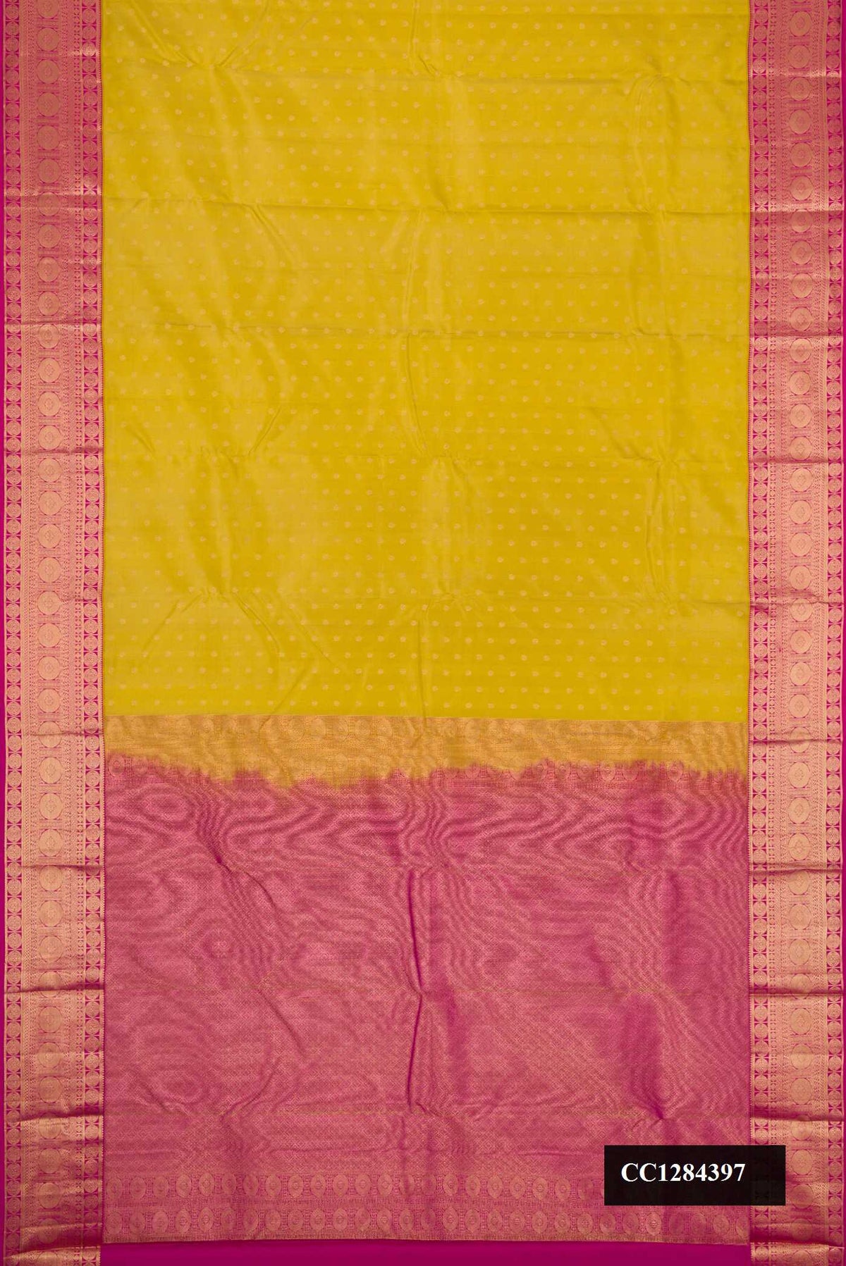 Mehandi Green Dual Tone Kanchipuram Silk Saree with Zari Butta on the body and Zari Border.  displayed on a mannequin