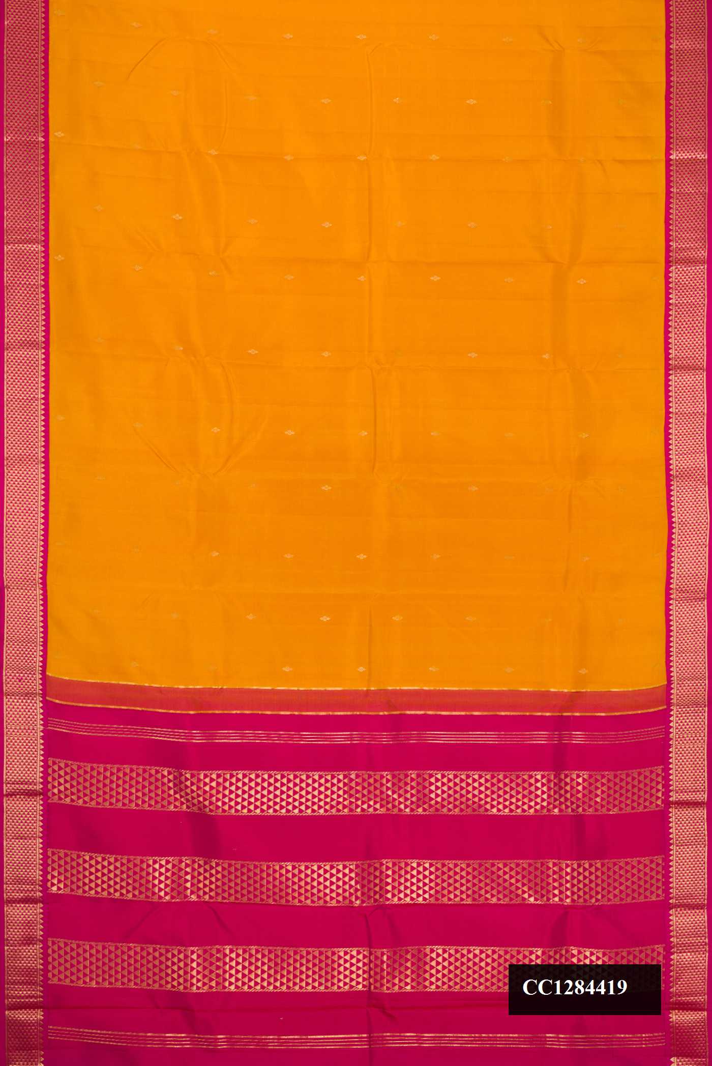 Mustard Dual Tone Kanchipuram Silk Saree with Zari Butta on the body and Zari Border.  displayed on a mannequin