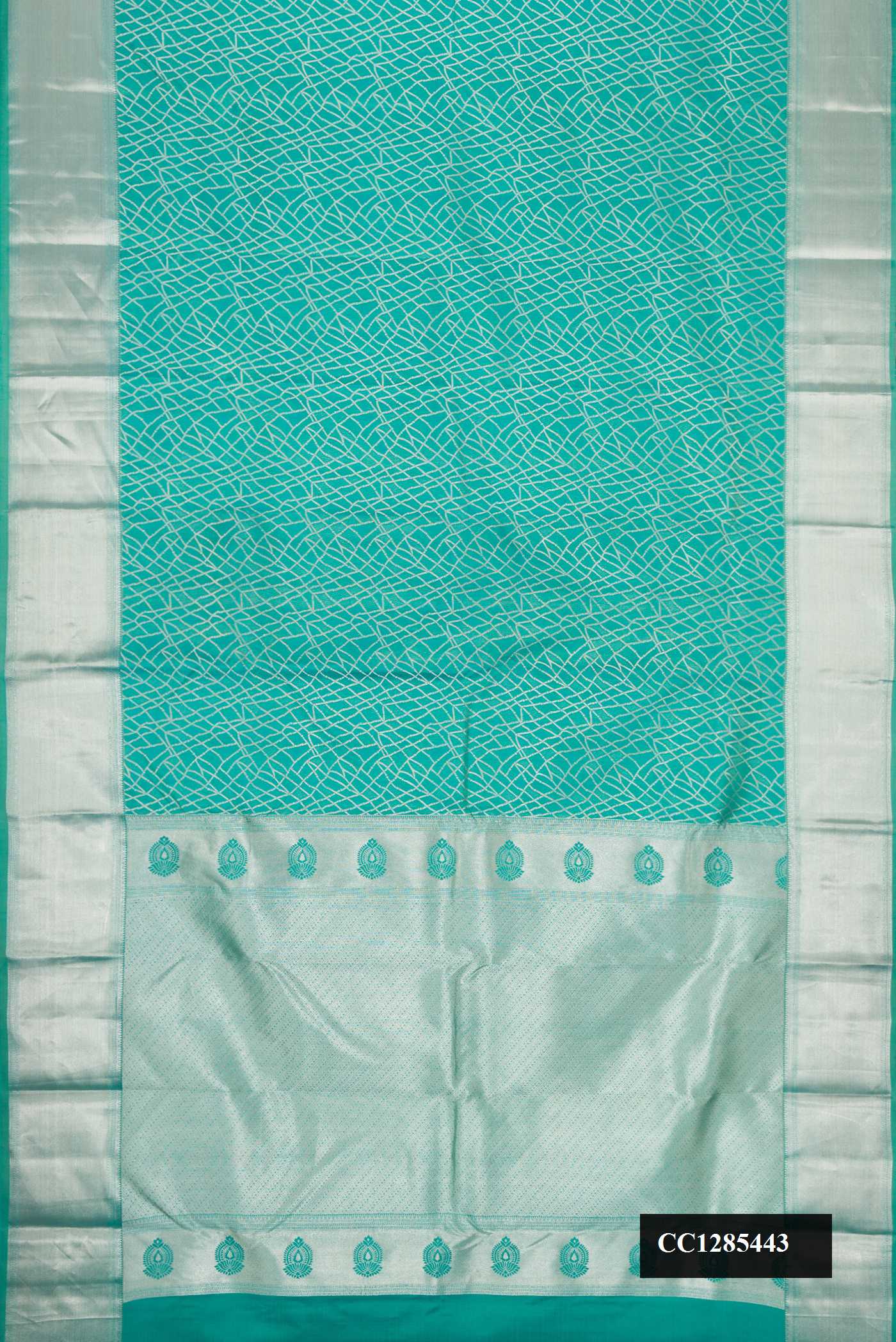Sea Green Dual Tone Kanchipuram Silk Saree with Zari Brocade on the body and Zari Border.  displayed on a mannequin