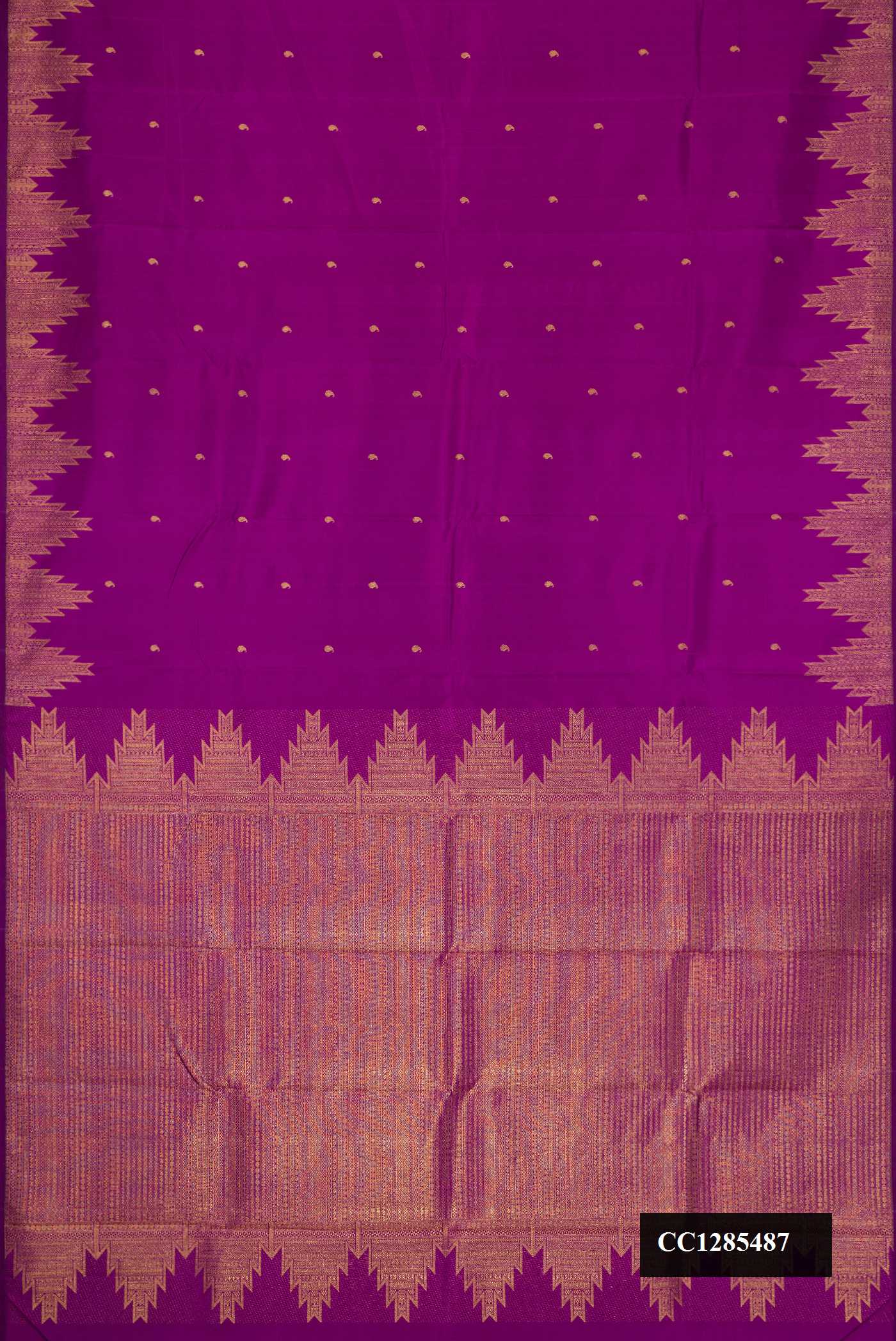 Purple Dual Tone Kanchipuram Silk Saree with Zari Butta on the body and Temple Border.  displayed on a mannequin