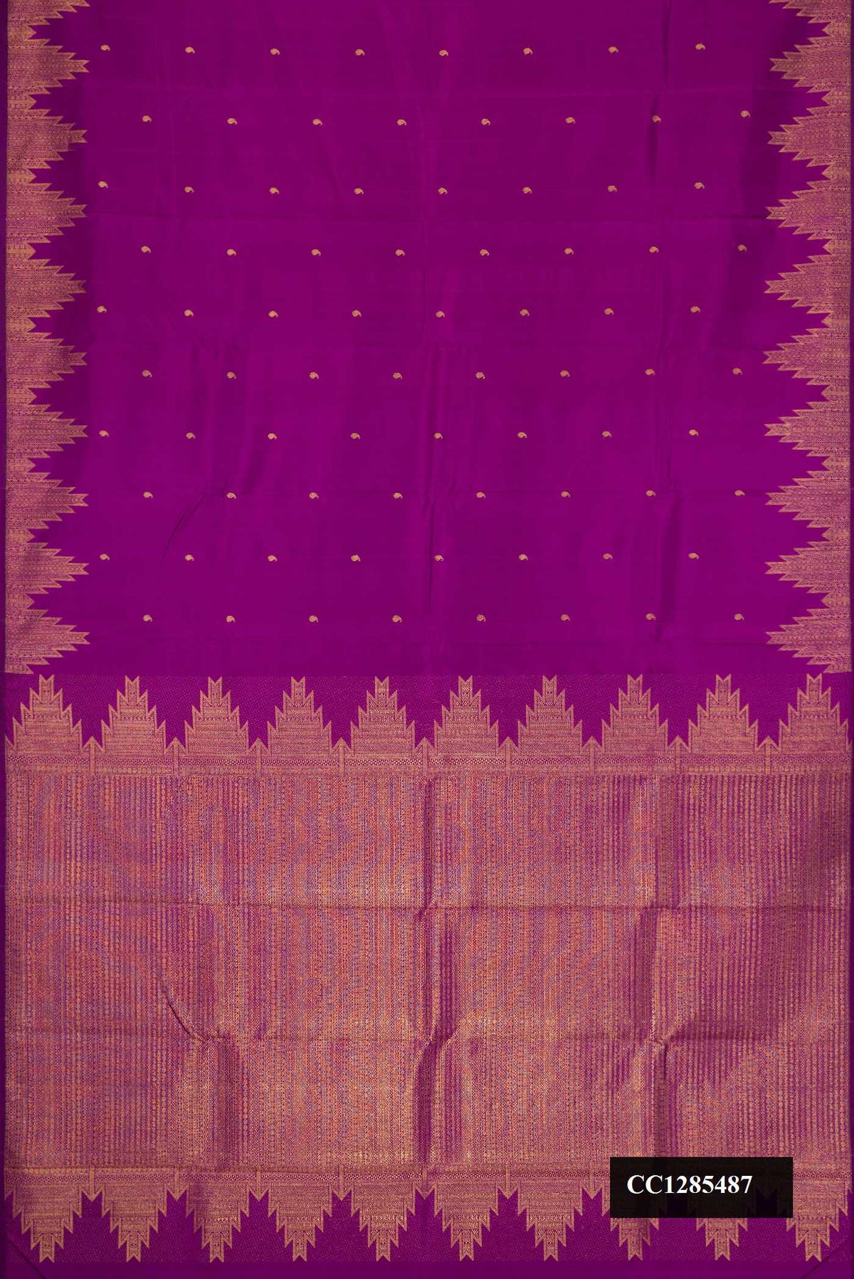 Purple Dual Tone Kanchipuram Silk Saree with Zari Butta on the body and Temple Border.  displayed on a mannequin