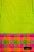 Parrot Green Dual Tone Kanchipuram Silk Saree with Zari Butta on the body and Without Border.  displayed on a mannequin