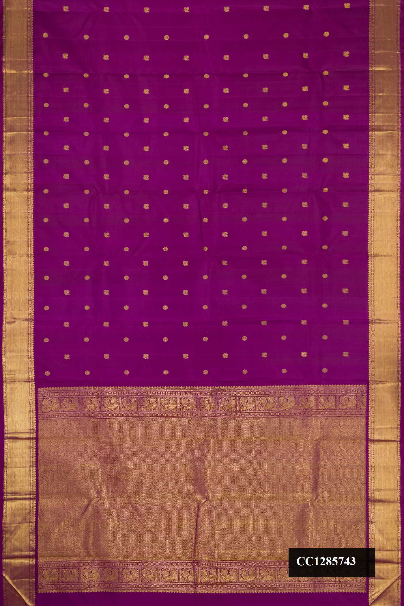 Purple Dual Tone Kanchipuram Silk Saree with Zari Butta on the body and Zari Border.  displayed on a mannequin