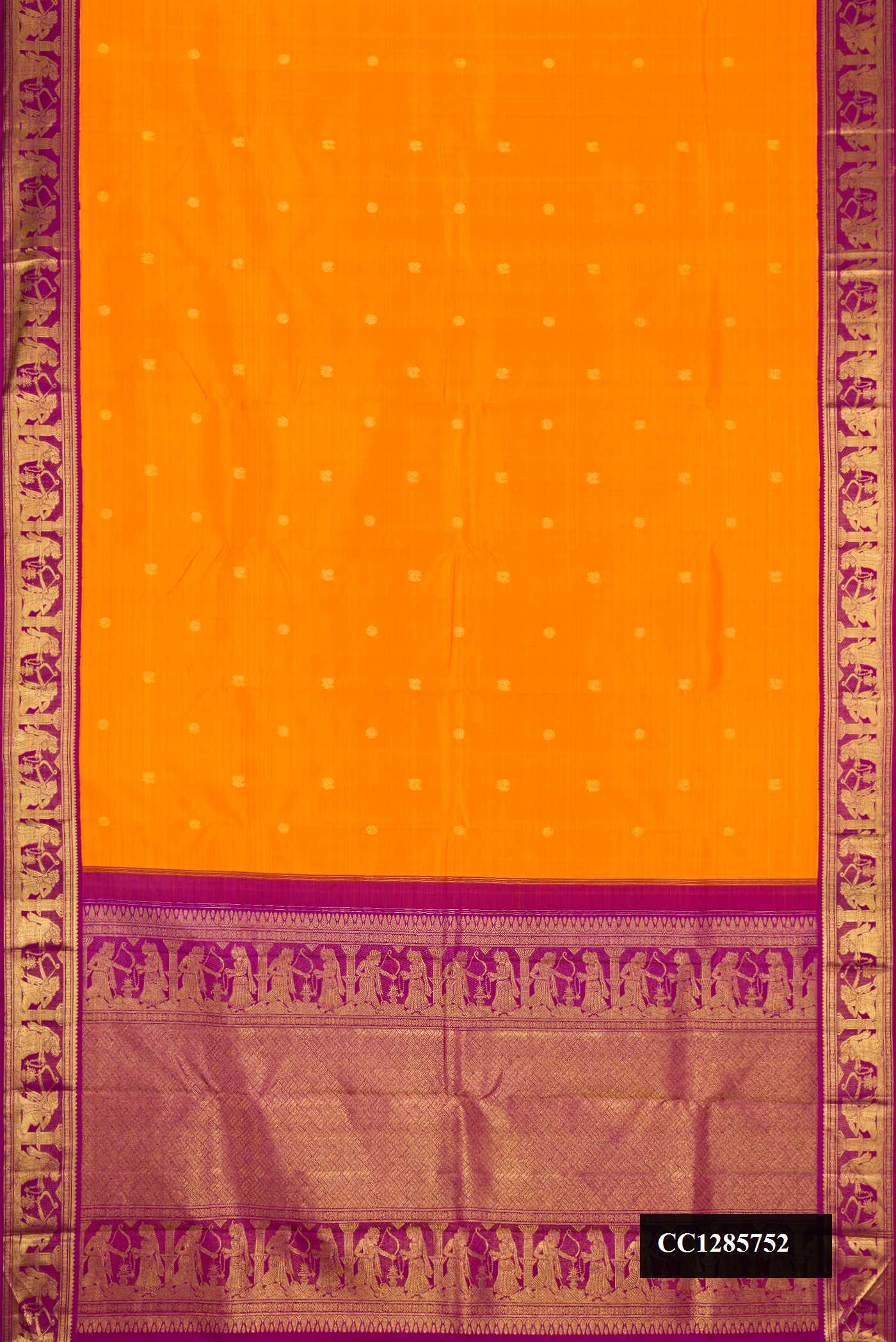 Orange Dual Tone Kanchipuram Silk Saree with Zari Butta on the body and Zari Border.  displayed on a mannequin