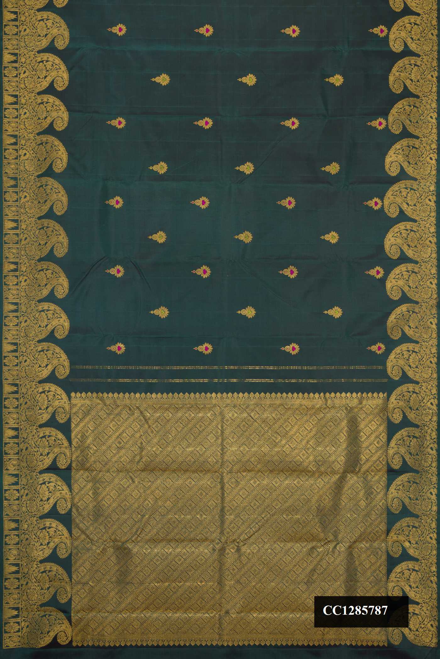 Green Dual Tone Kanchipuram Silk Saree with Zari And Thread Butta on the body and Zari Border.  displayed on a mannequin