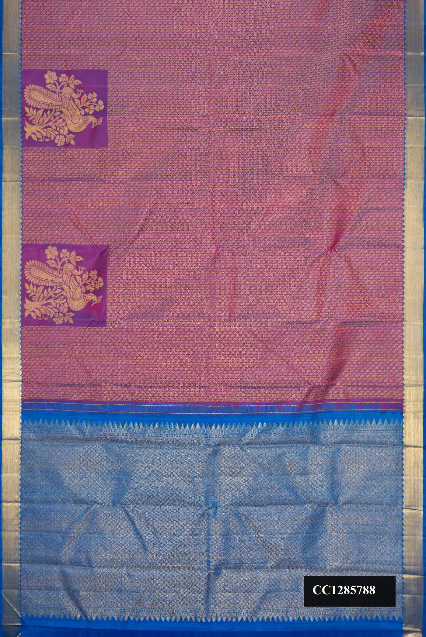 Purple Dual Tone Kanchipuram Silk Saree with Zari Brocade on the body and Fancy Border.  displayed on a mannequin