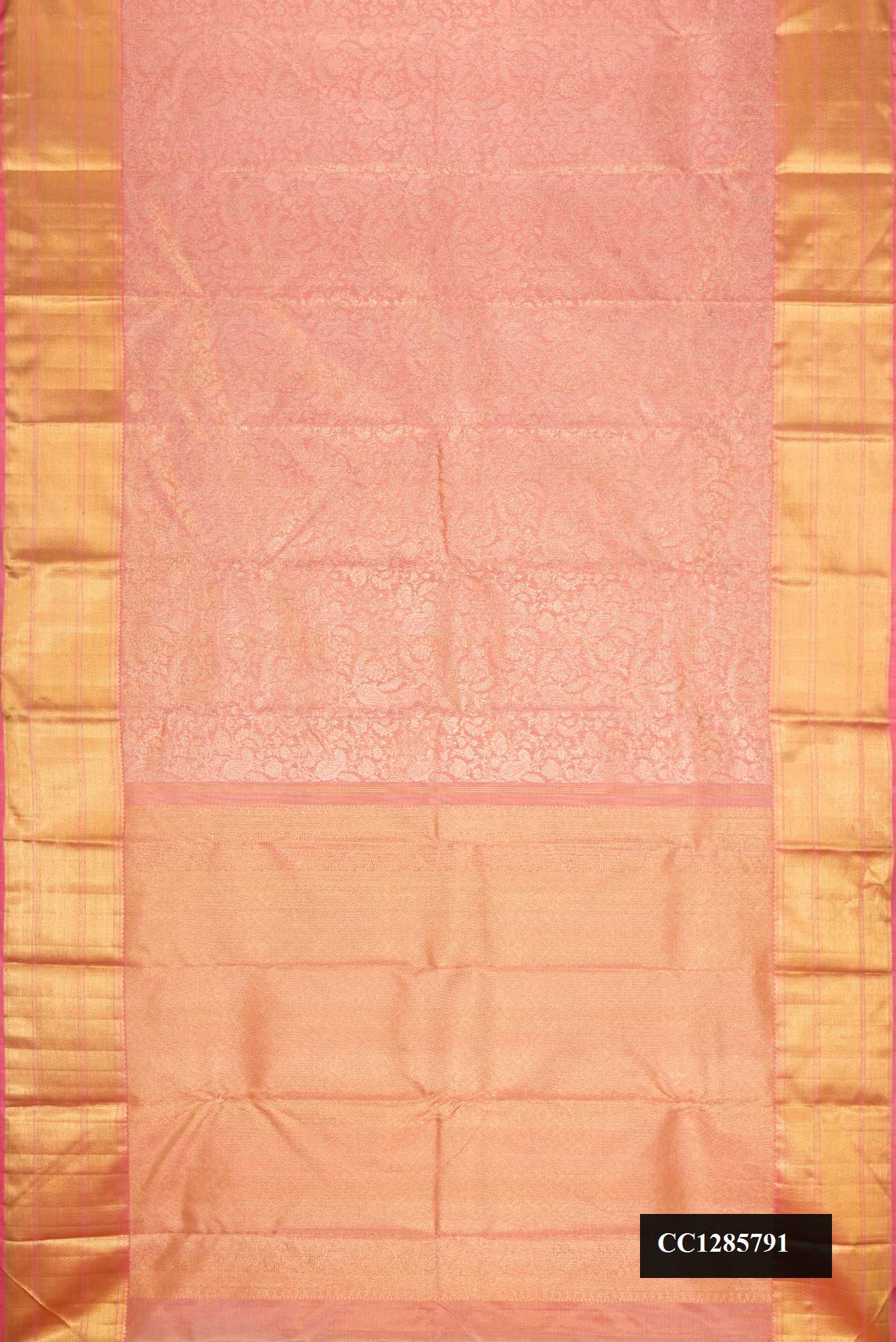 Pink Dual Tone Kanchipuram Silk Saree with Zari Brocade on the body and Zari Border.  displayed on a mannequin