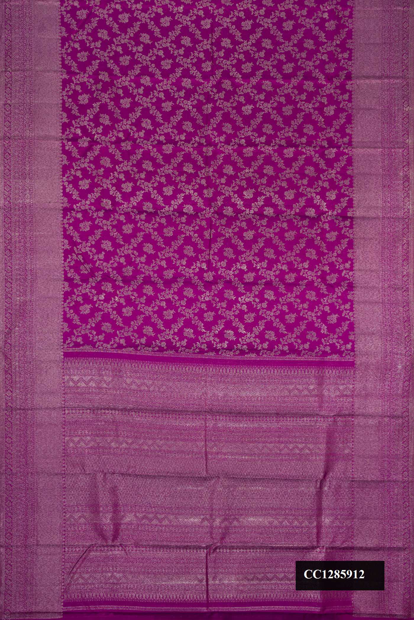 Purple Dual Tone Kanchipuram Silk Saree with Zari Brocade on the body and Zari Border.  displayed on a mannequin