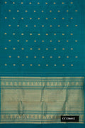 Peacock Blue Dual Tone Kanchipuram Silk Saree with Zari Butta on the body and Without Border.  displayed on a mannequin