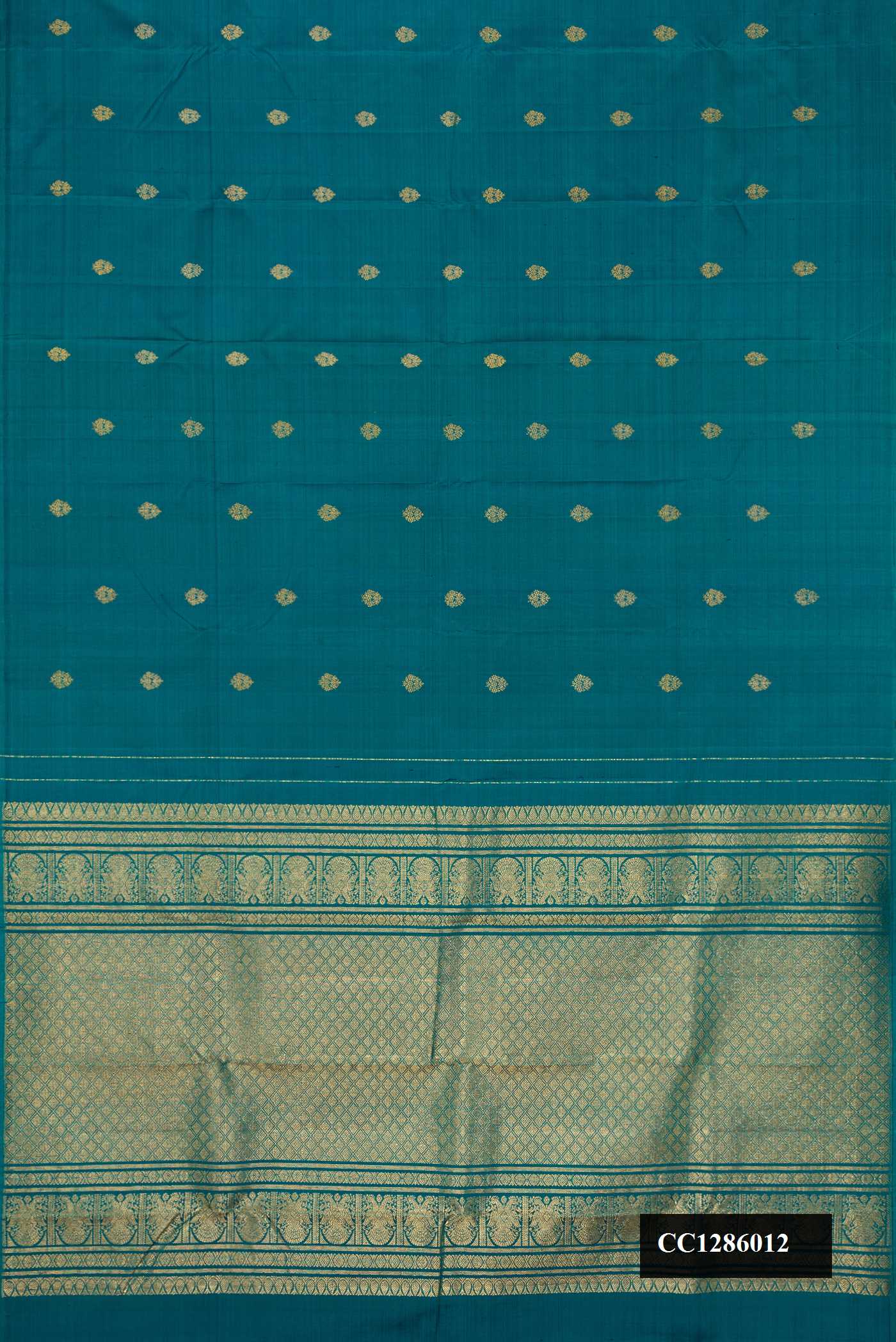 Peacock Blue Dual Tone Kanchipuram Silk Saree with Zari Butta on the body and Without Border.  displayed on a mannequin