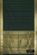 Bottle Green Dual Tone Kanchipuram Silk Saree with Zari Butta on the body and Zari Border.  displayed on a mannequin