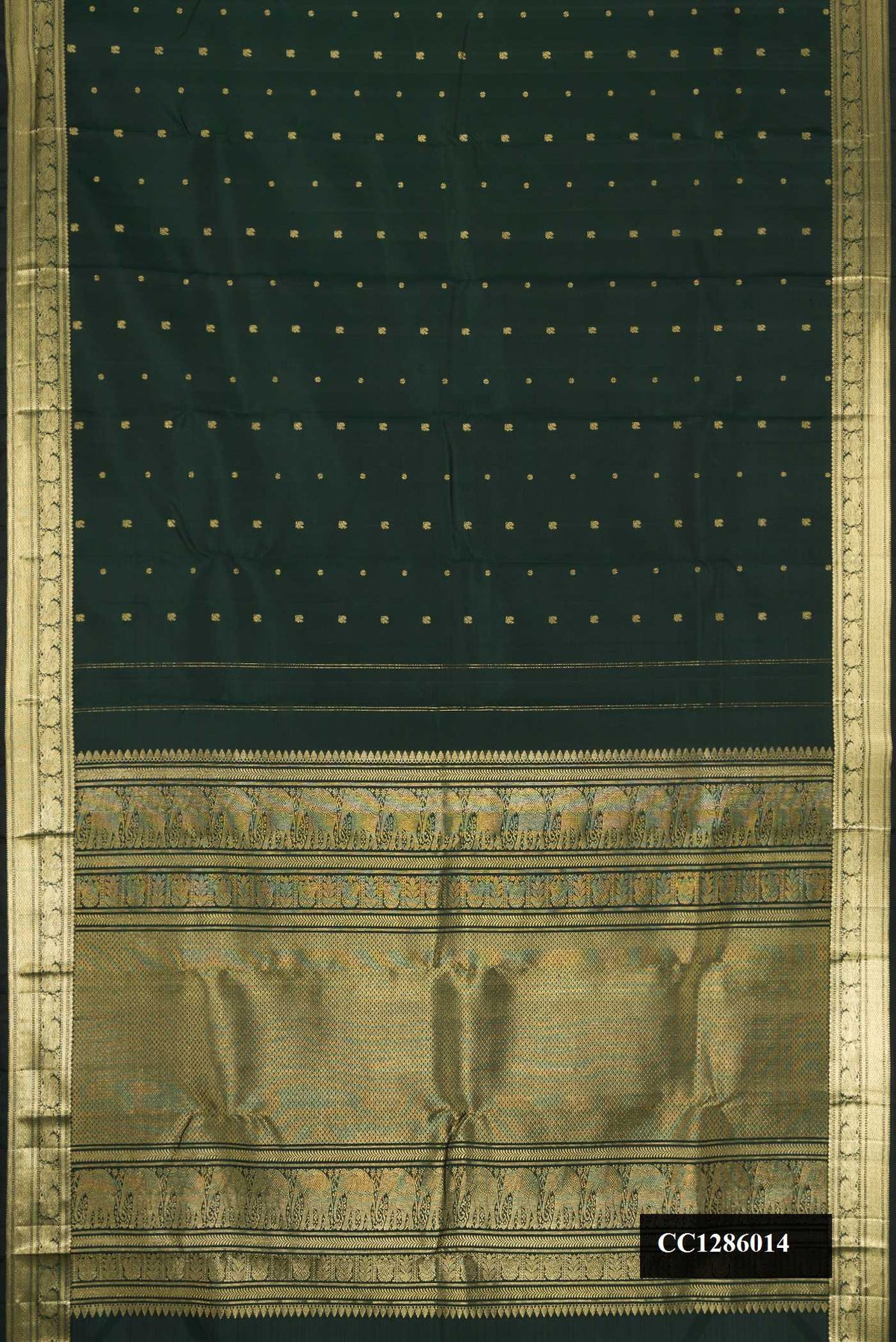 Bottle Green Dual Tone Kanchipuram Silk Saree with Zari Butta on the body and Zari Border.  displayed on a mannequin