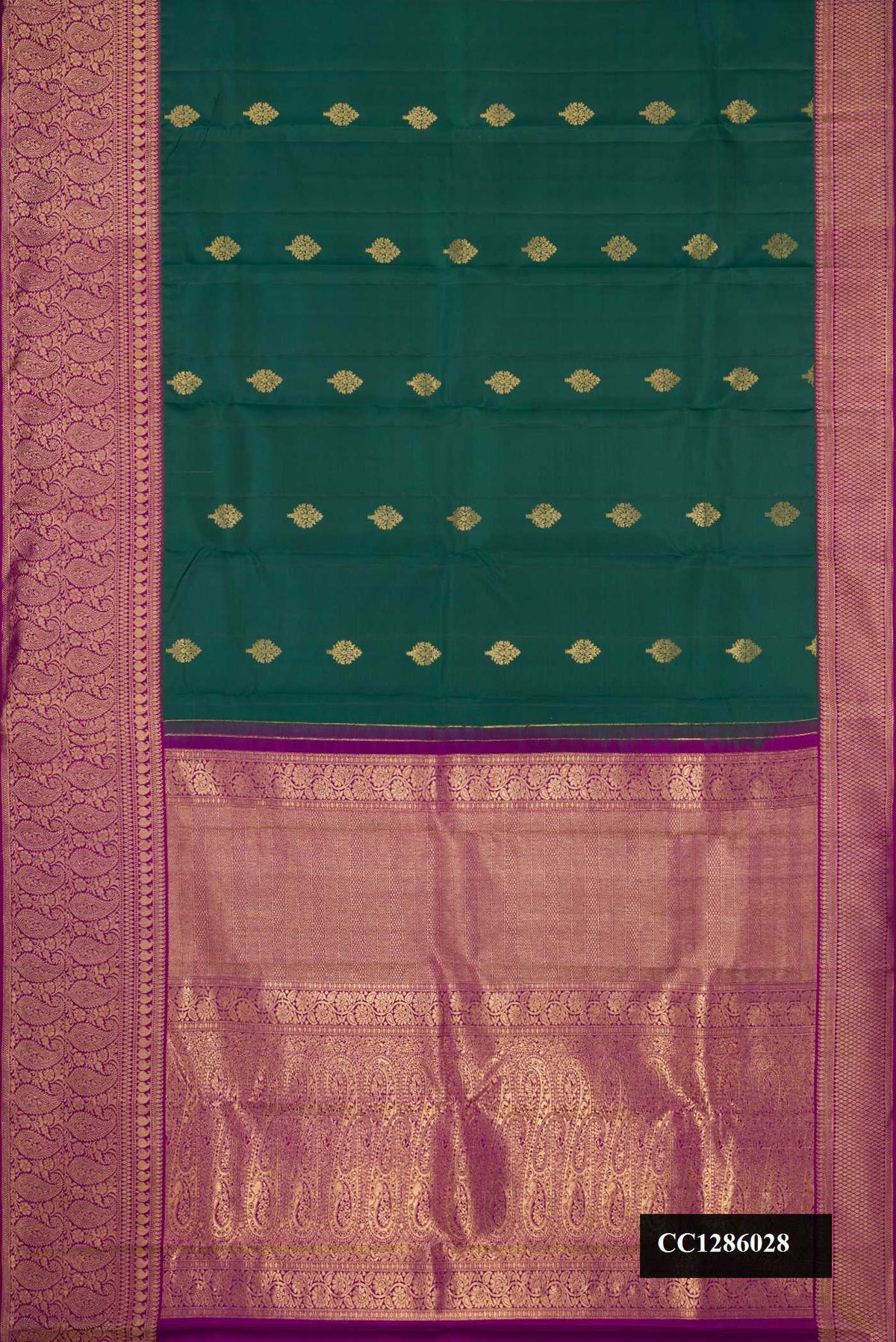 Bottle Green Dual Tone Kanchipuram Silk Saree with Zari Butta on the body and Zari Border.  displayed on a mannequin