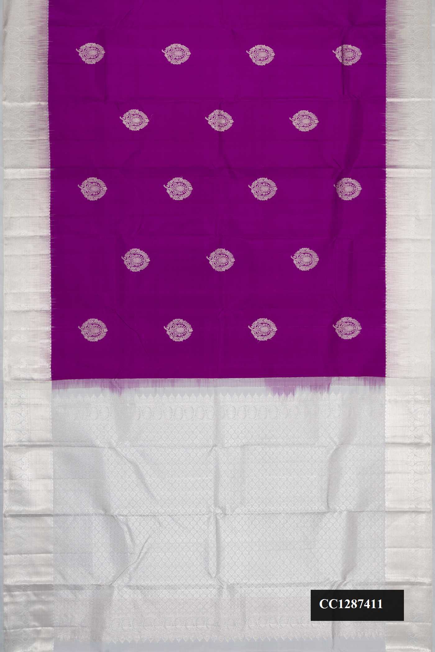 Violet Dual Tone Kanchipuram Silk Saree with Zari Butta on the body and Zari Border.  displayed on a mannequin