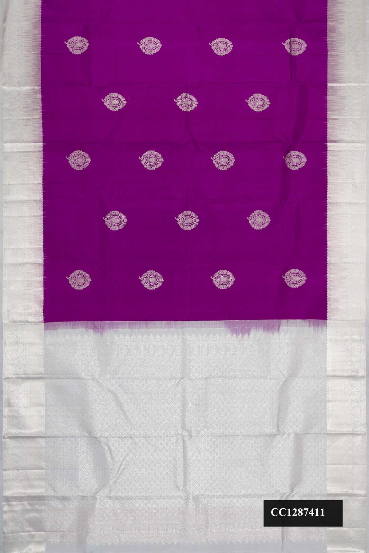 Violet Dual Tone Kanchipuram Silk Saree with Zari Butta on the body and Zari Border.  displayed on a mannequin