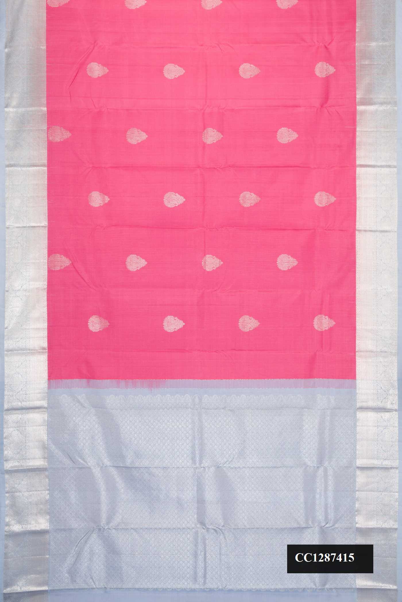 Pink Dual Tone Kanchipuram Silk Saree with Zari Butta on the body and Zari Border.  displayed on a mannequin
