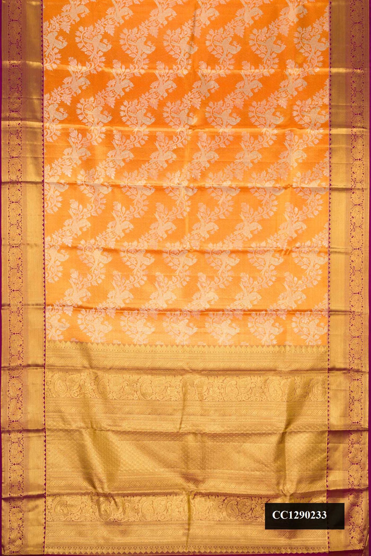 Orange Dual Tone Kanchipuram Tissue Silk Saree with Zari Brocade on the body and Zari Border.  displayed on a mannequin