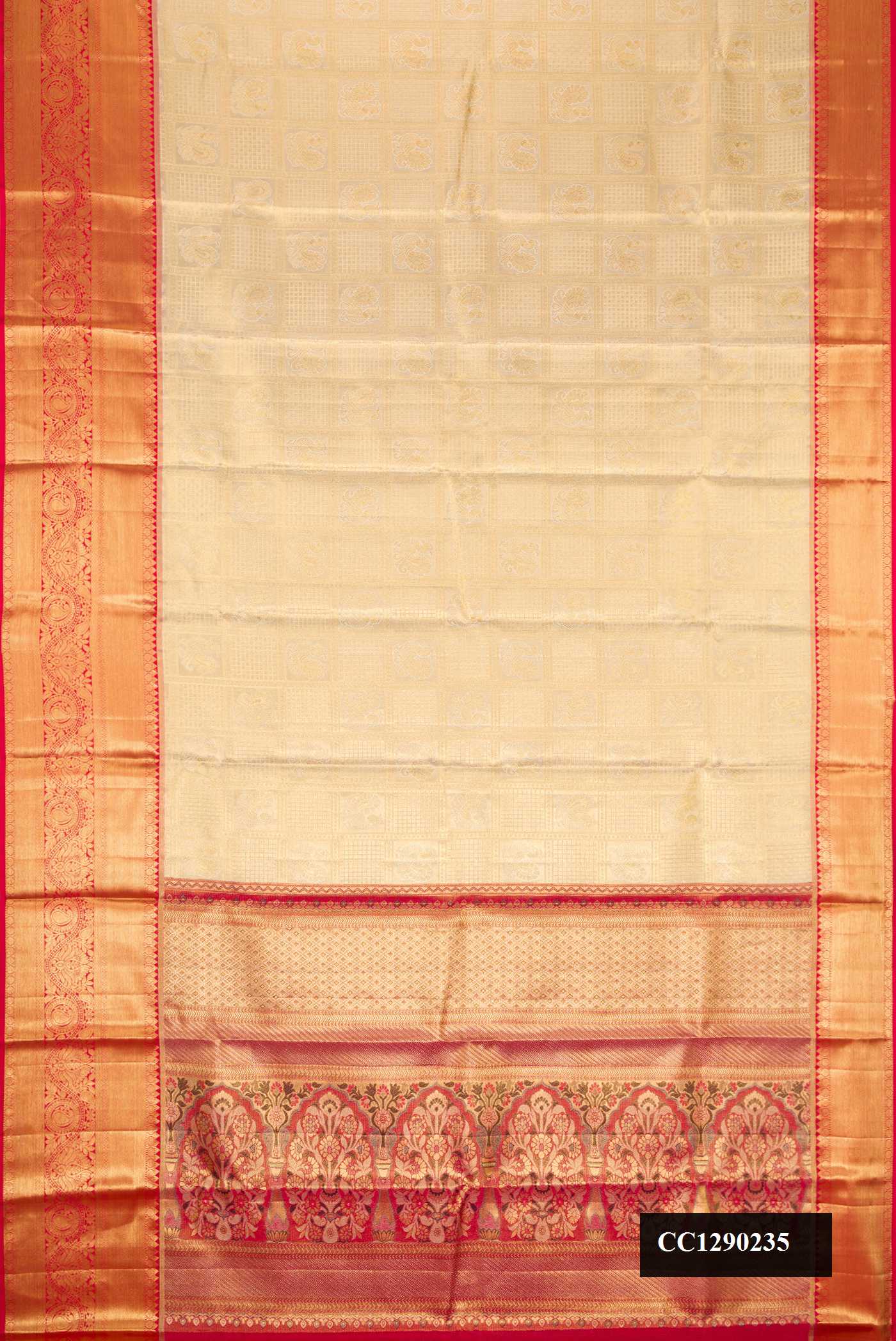 Beige Dual Tone Kanchipuram Tissue Silk Saree with Zari Brocade on the body and Zari Border.  displayed on a mannequin