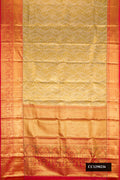 Golden Dual Tone Kanchipuram Silk Saree with Zari Brocade on the body and Zari Border.  displayed on a mannequin