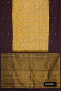 Mustard Dual Tone Kanchipuram Silk Saree with Zari Brocade on the body and Zari Border.  displayed on a mannequin
