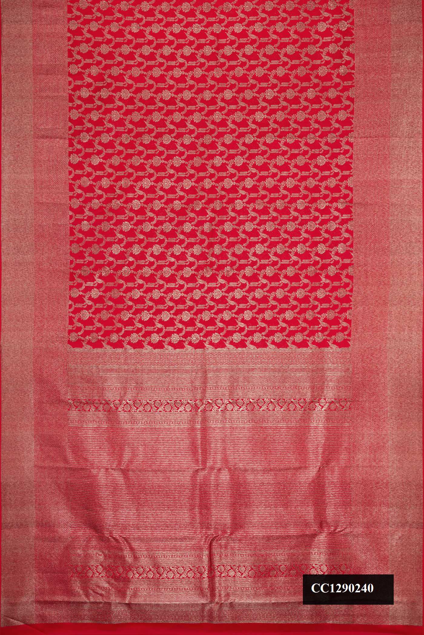 Red Dual Tone Kanchipuram Silk Saree with Zari Butta on the body and Zari Border.  displayed on a mannequin
