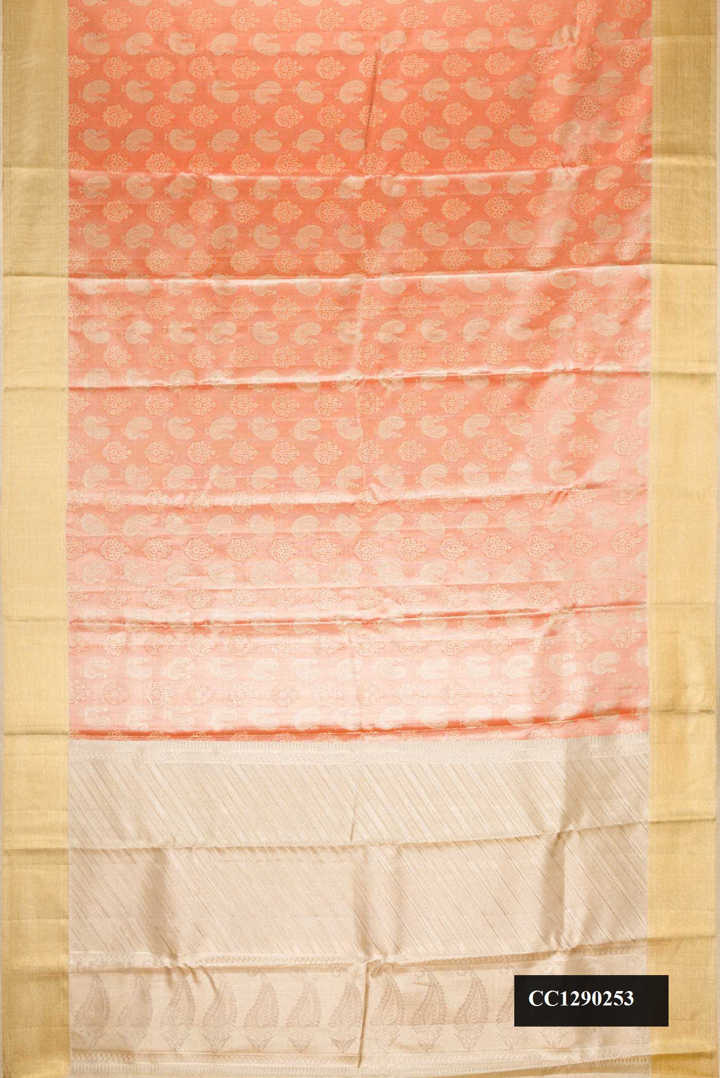 Orange Dual Tone Kanchipuram Tissue Silk Saree with Zari Brocade on the body and Zari Border.  displayed on a mannequin