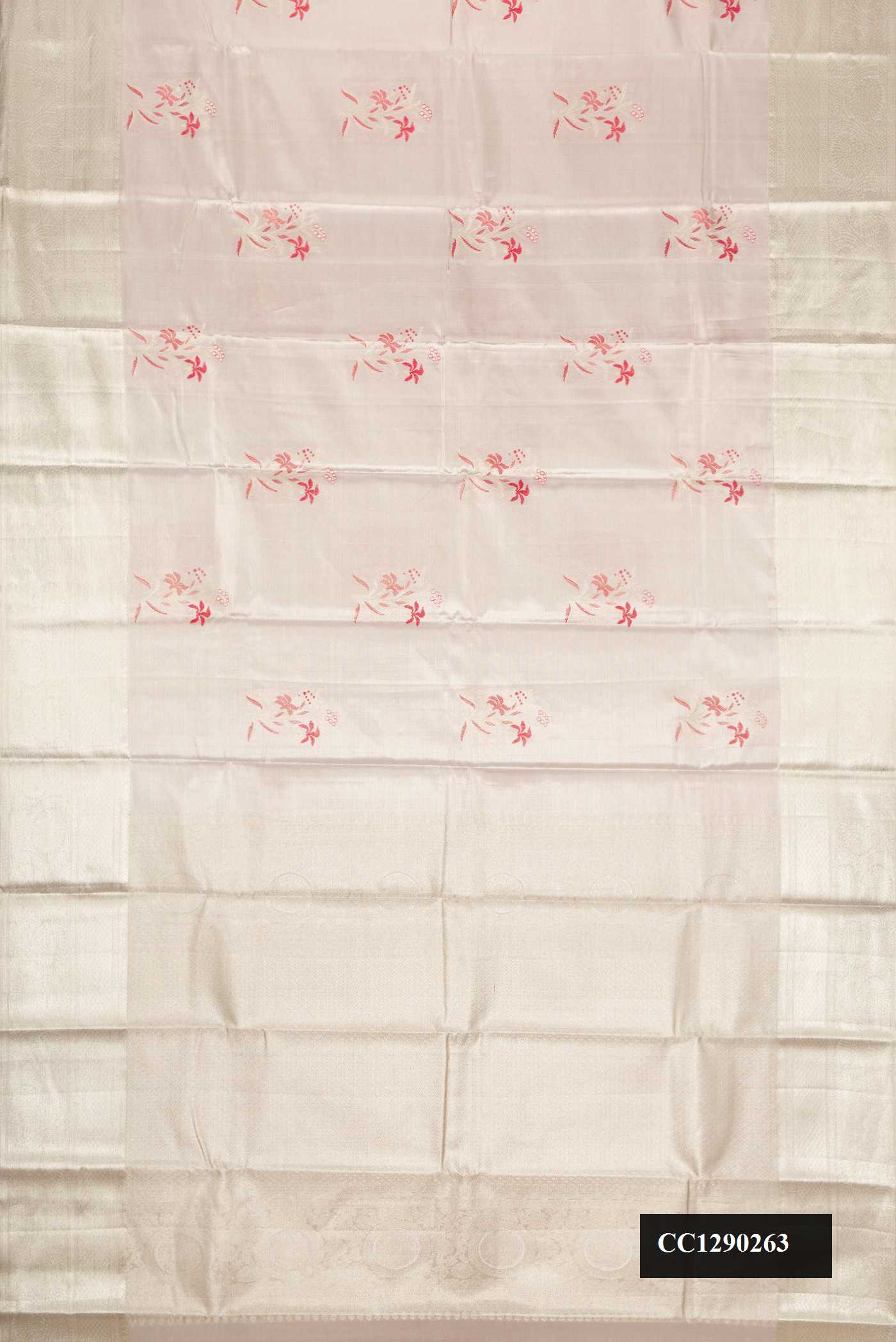 Silver Dual Tone Kanchipuram Tissue Silk Saree with Zari Brocade on the body and Zari Border.  displayed on a mannequin